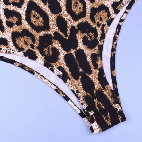 NEA - Body top femme à manches longues avec des imprimés léopard